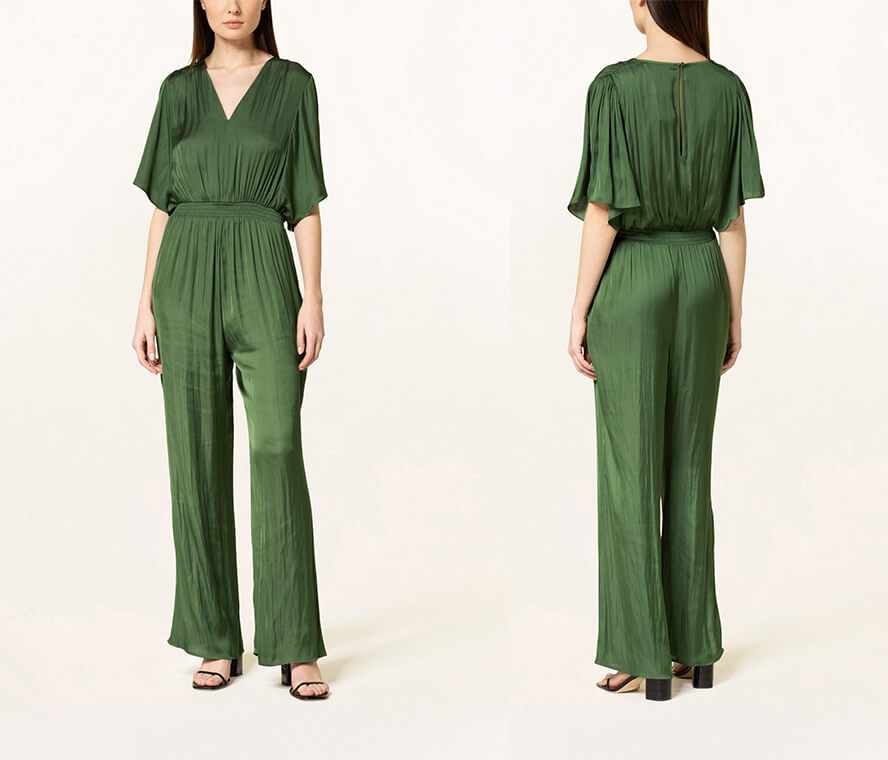 Frau im pastellfarbenen Jumpsuit